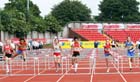 Far left No 19 Alicia Barrett (Derby) wins from No 20 Emma Schaanning (Derby) and No 67 Hollie Williamson (Shrop) in the Junior Girls 75 metres Hurdles.